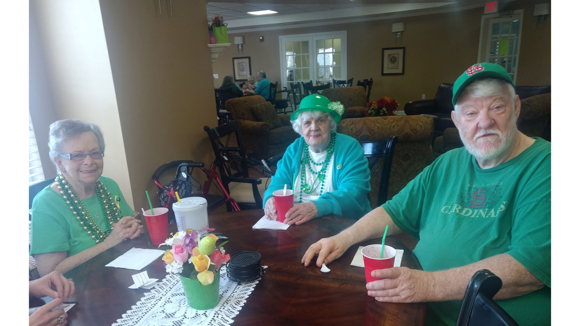 The Wyndham Park residents gather in their St. Patrick’s Day attire for their annual party.
