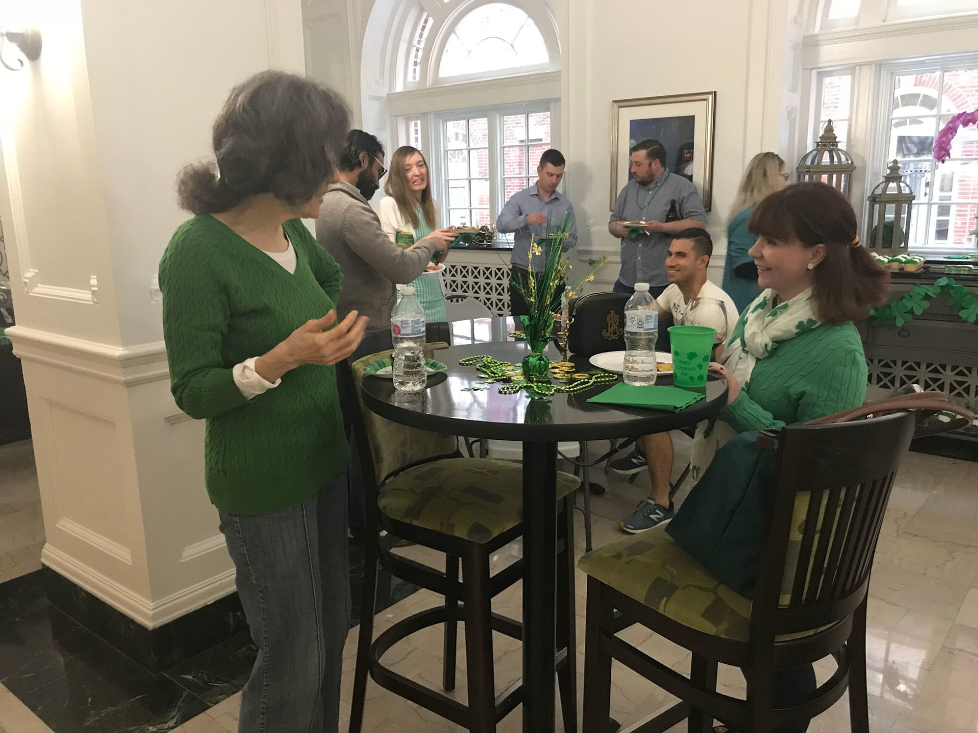 The Residences at Forest Park Hotel residents celebrate St. Patrick's Day in their loft apartment community.