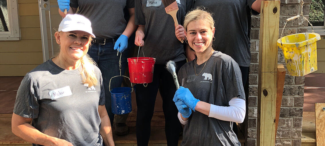 Women standing together with tools