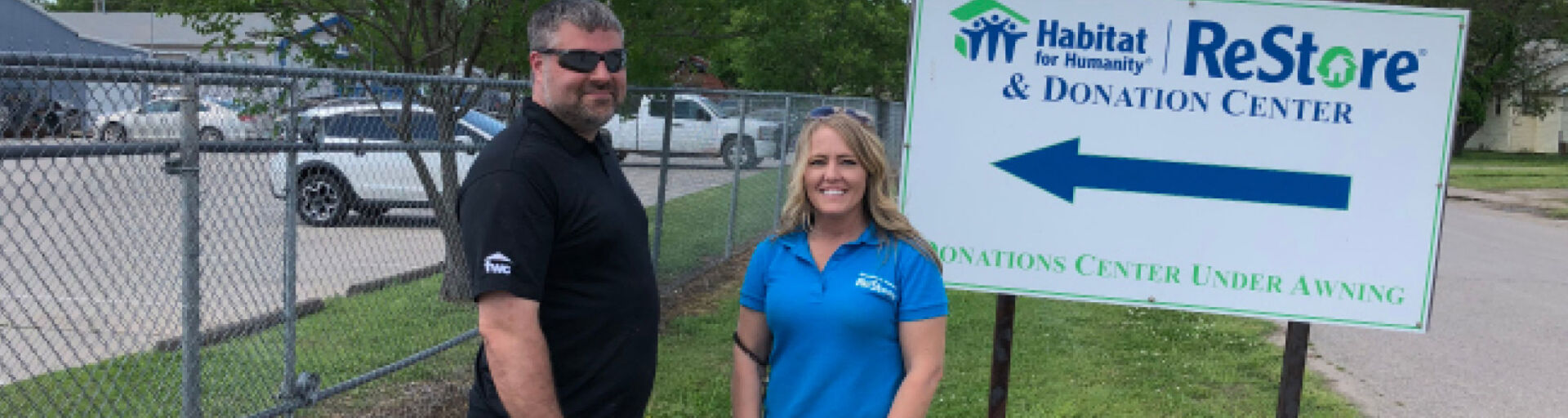 FWC Project Manager Kevin Harvey and ReStore Manager Jennifer Muret pose for a photo after FWC’s donation.